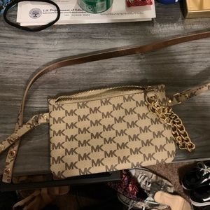 small michael kors purse. MK logo pattern. Chain strap + Reg. Strap. 7.5” x 5”.
